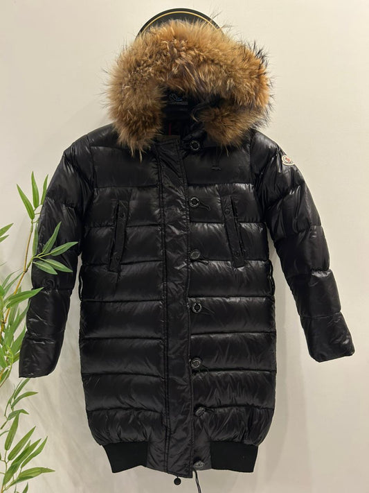 Moncler Women's down puffer jacket with a fur-trimmed hood.