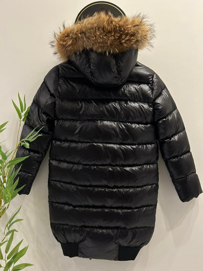 Moncler Women's down puffer jacket with a fur-trimmed hood.