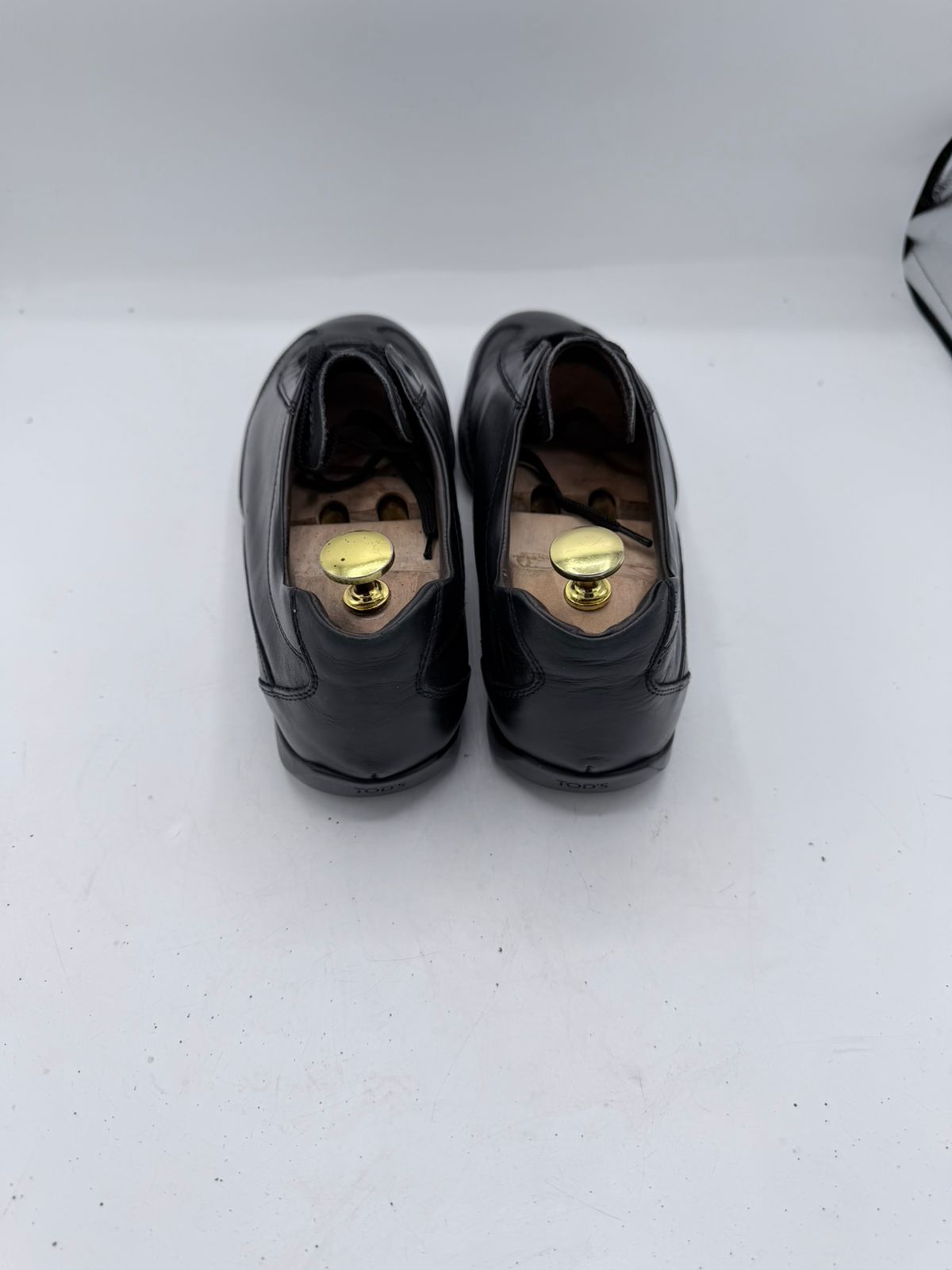 Tod’s Black Leather Low-Top Sneakers