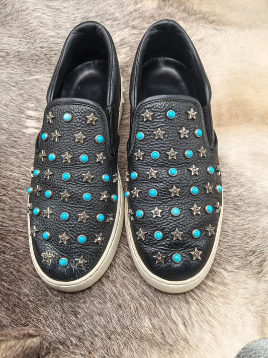 Star-and-turquoise studded slip-on sneakers
