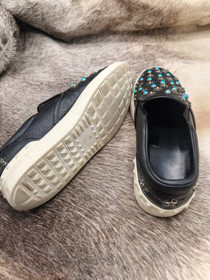 Star-and-turquoise studded slip-on sneakers